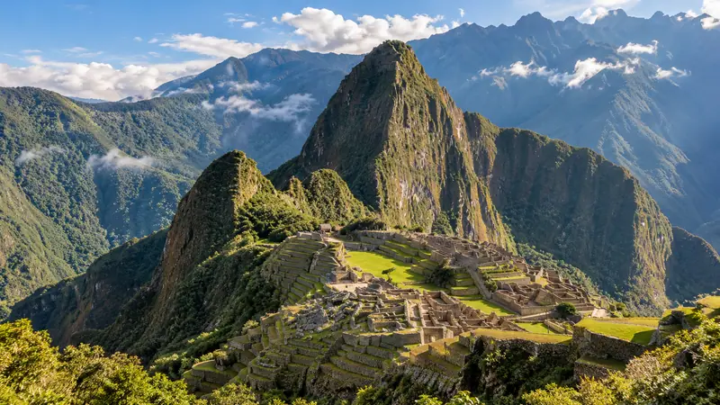 Machu Picchu citadel and Huayna Picchu among green mountains