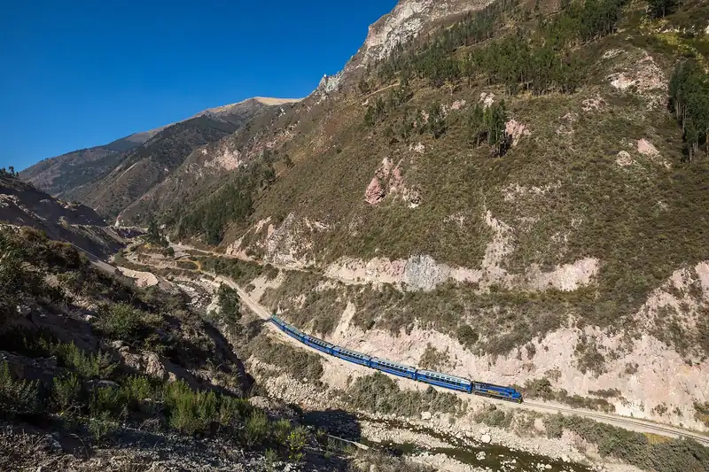 PeruRail Vistadome train in the Urubamba valley on the Poroy–Ollantaytambo line